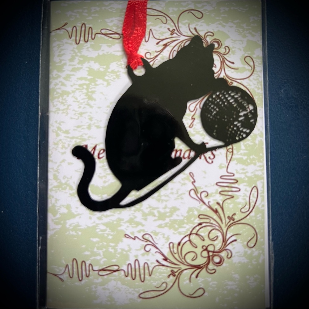 Black cat with ball of yarn metal ornament or bookmark with red ribbon